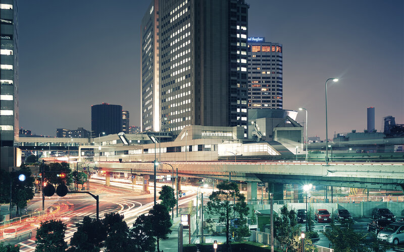 Nighttime cityscape with illuminated buildings