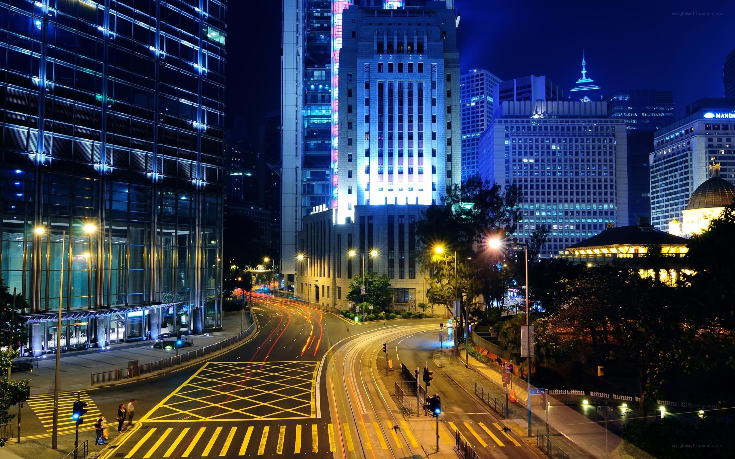 Nighttime cityscape with illuminated buildings
