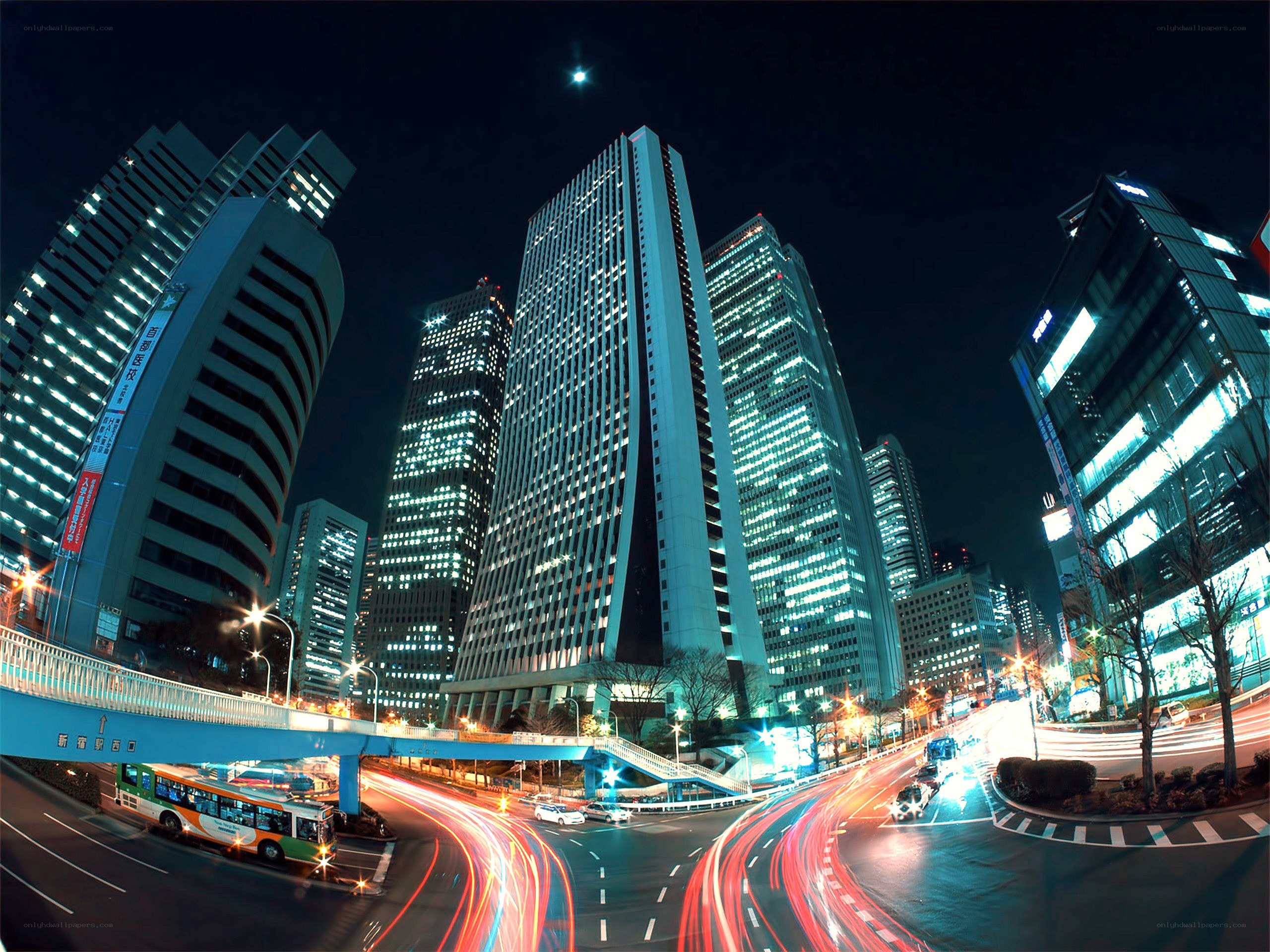 Nighttime cityscape with light trails