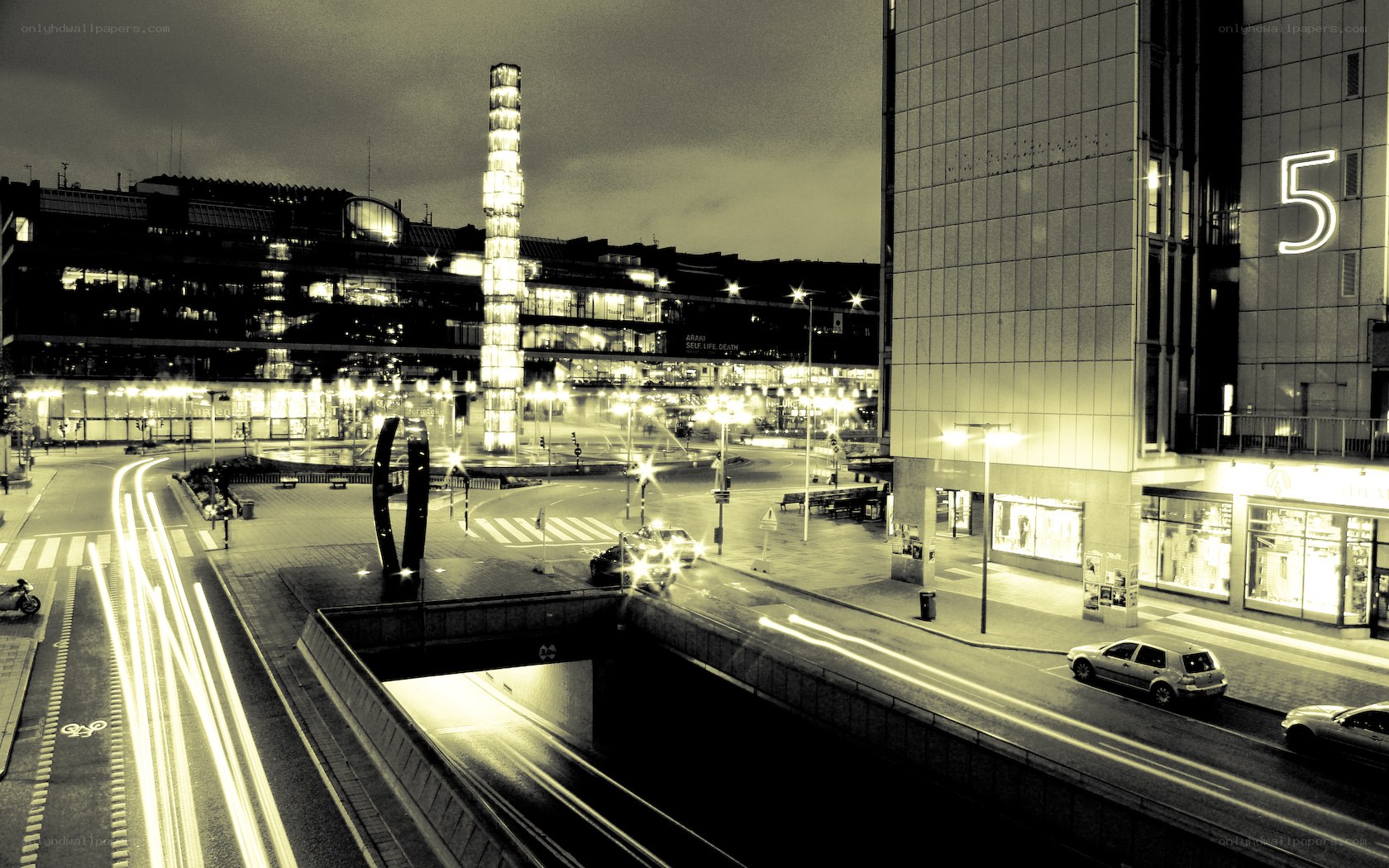 Nighttime cityscape with light trails
