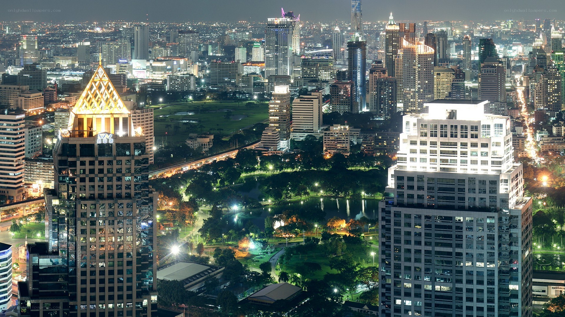 nighttime cityscape with park