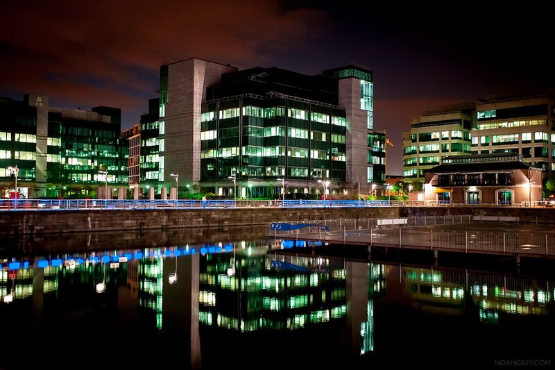 nighttime cityscape with reflections