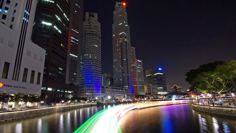 nighttime cityscape with river