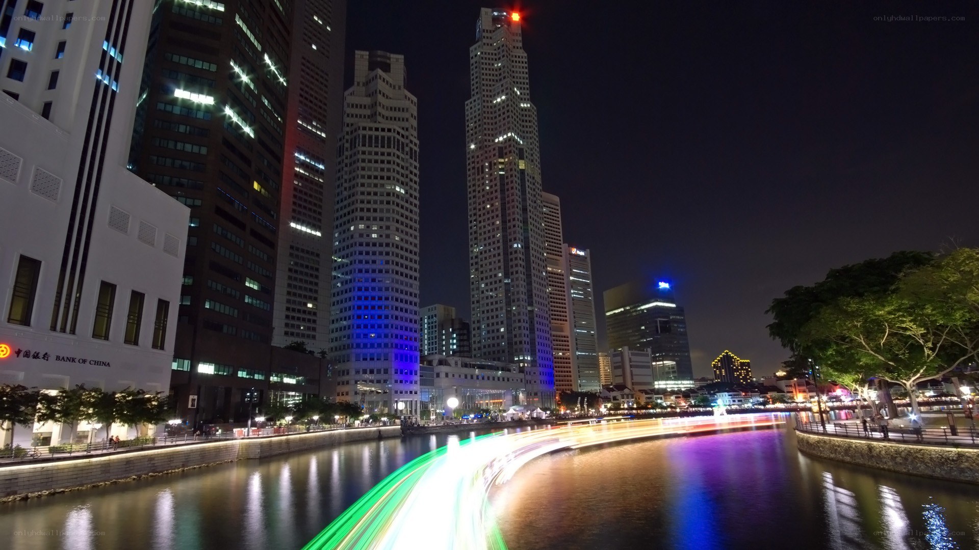nighttime cityscape with river