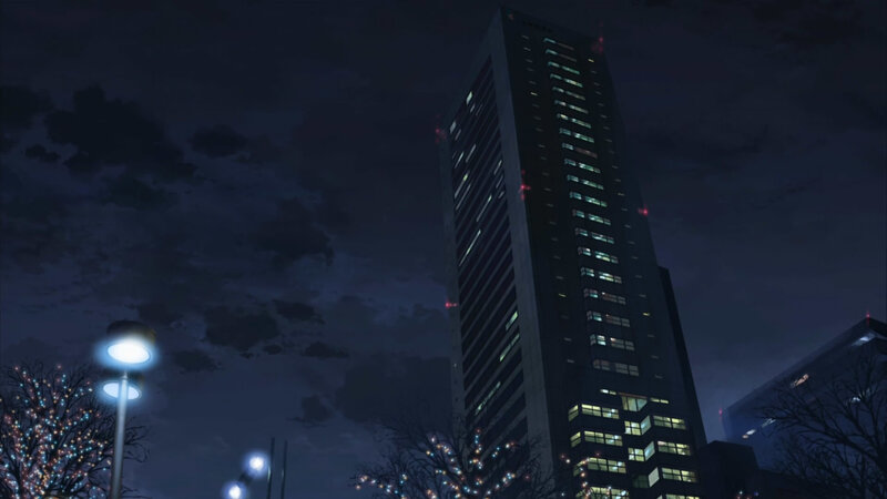 nighttime cityscape with skyscraper