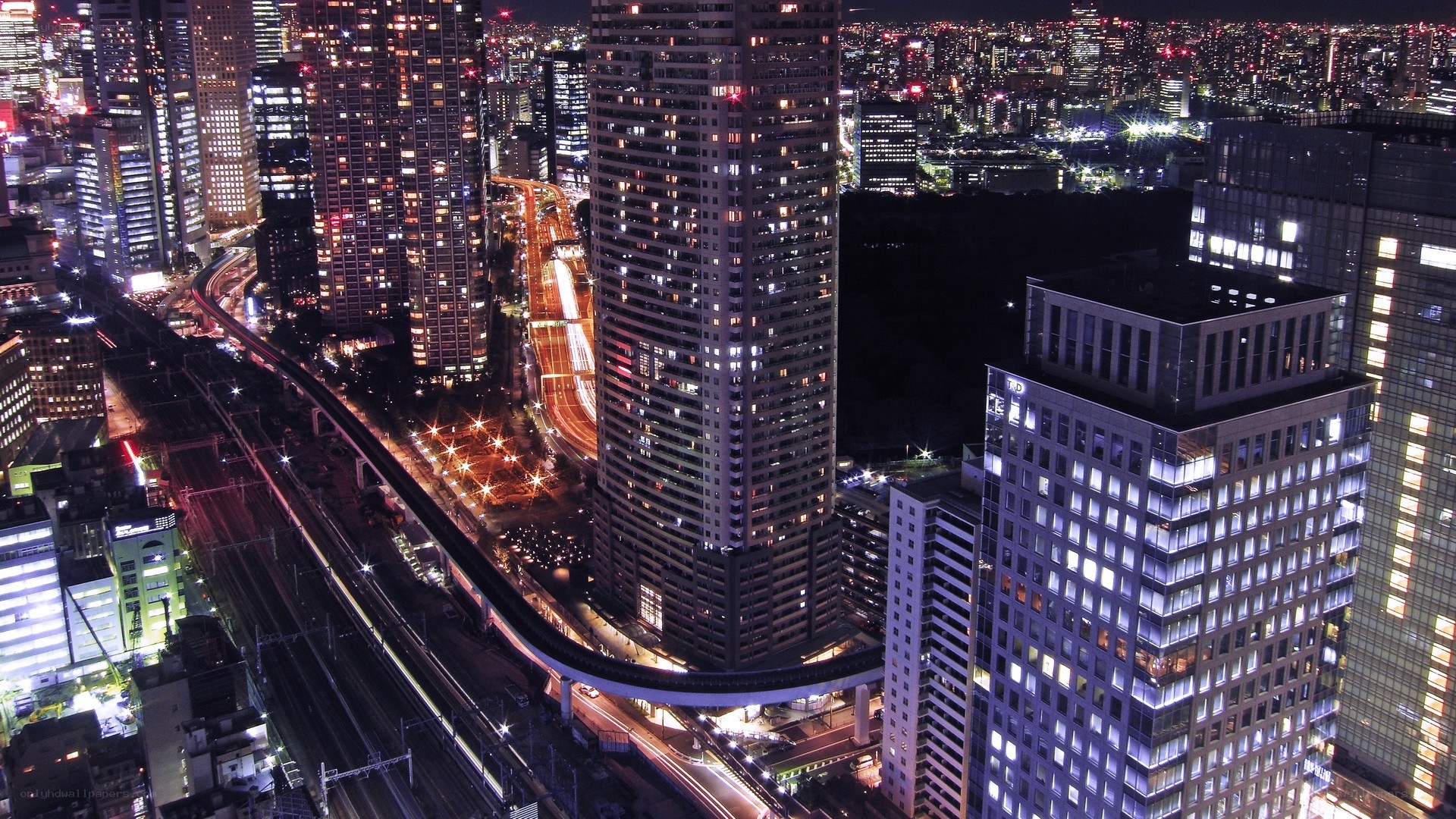 nighttime cityscape with skyscrapers