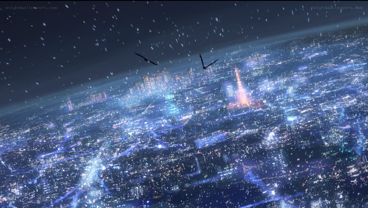 nighttime cityscape with snow