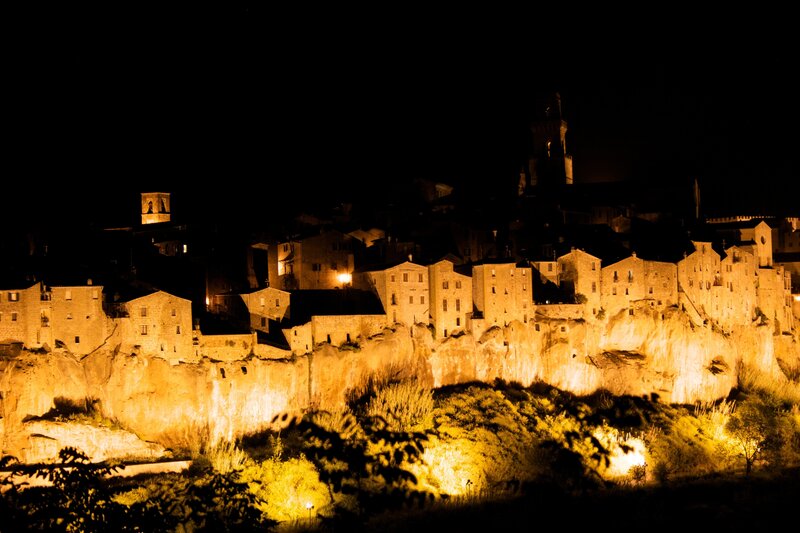 nighttime cliffside village