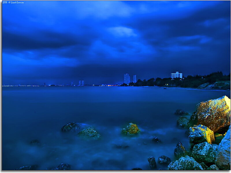 Nighttime Coastal Cityscape — Blue