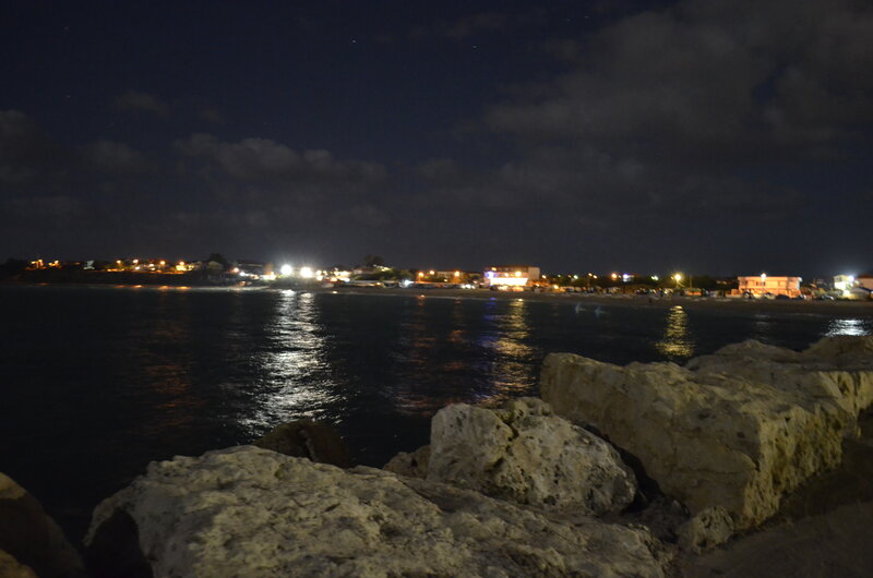Nighttime Coastal Town — Black, Calm