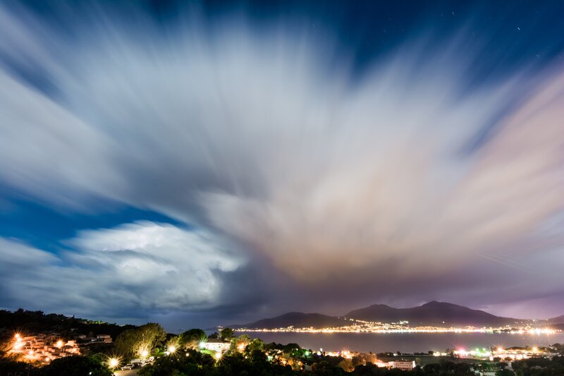 Nighttime Coastal Town — Blue, Dramatic