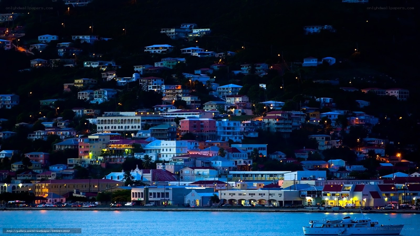nighttime coastal town view