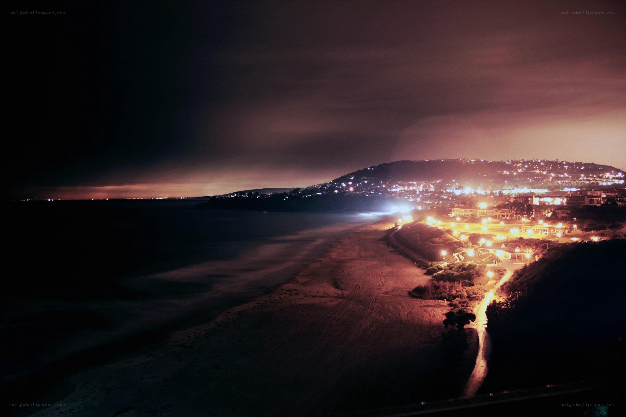 nighttime coastal town view