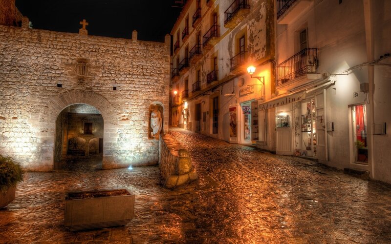 nighttime cobblestone street
