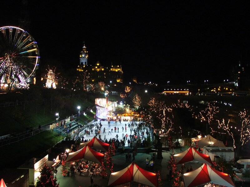 nighttime festival with ice rink