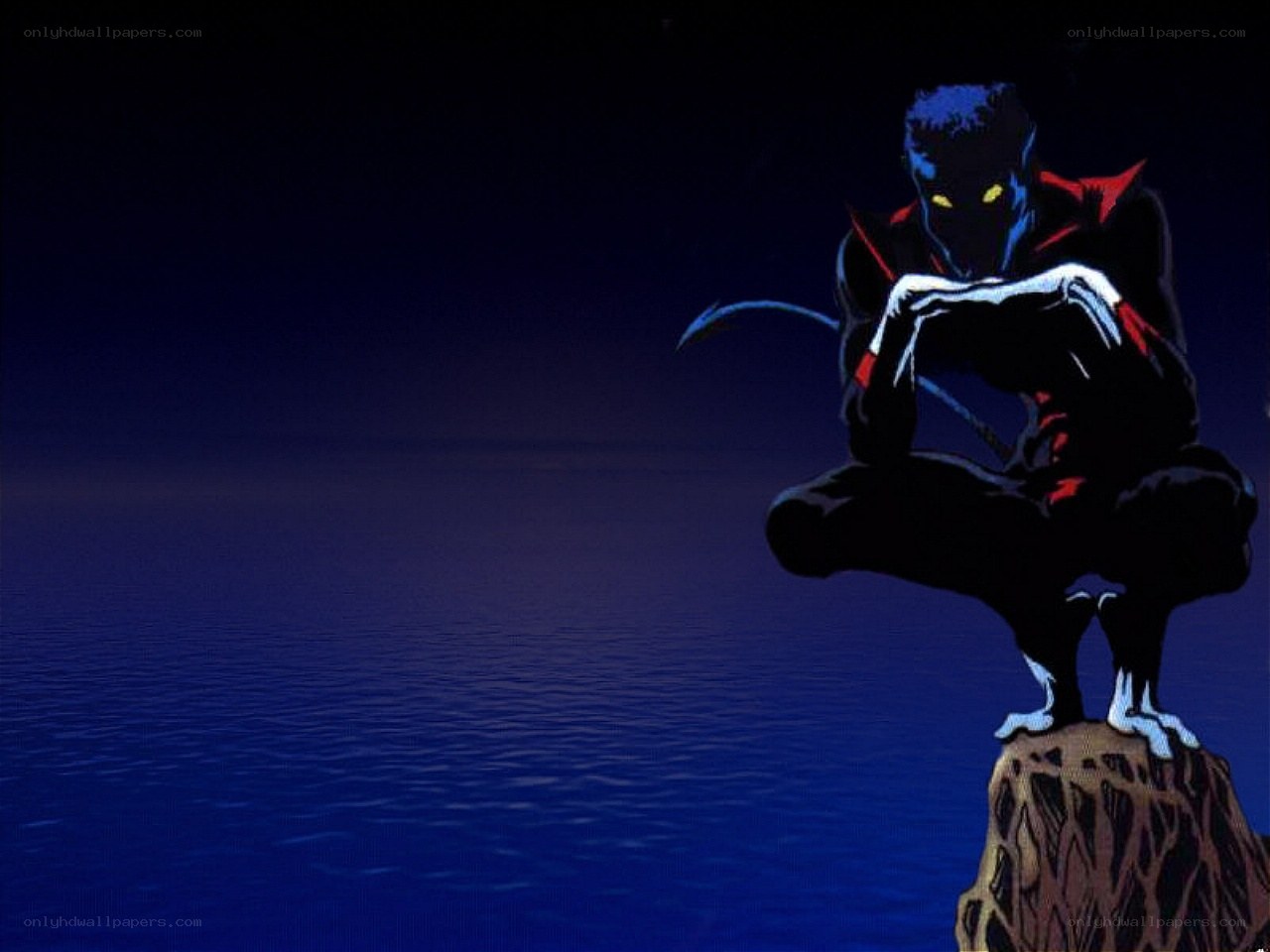Nighttime figure on a rock