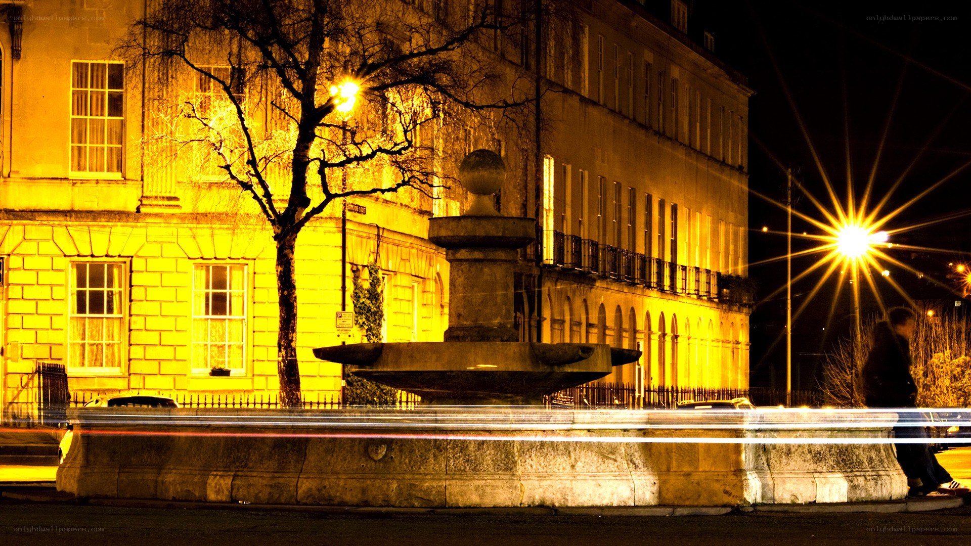 Nighttime fountain in a city