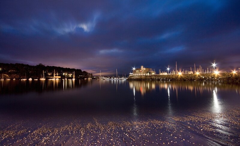 Nighttime harbor with lights
