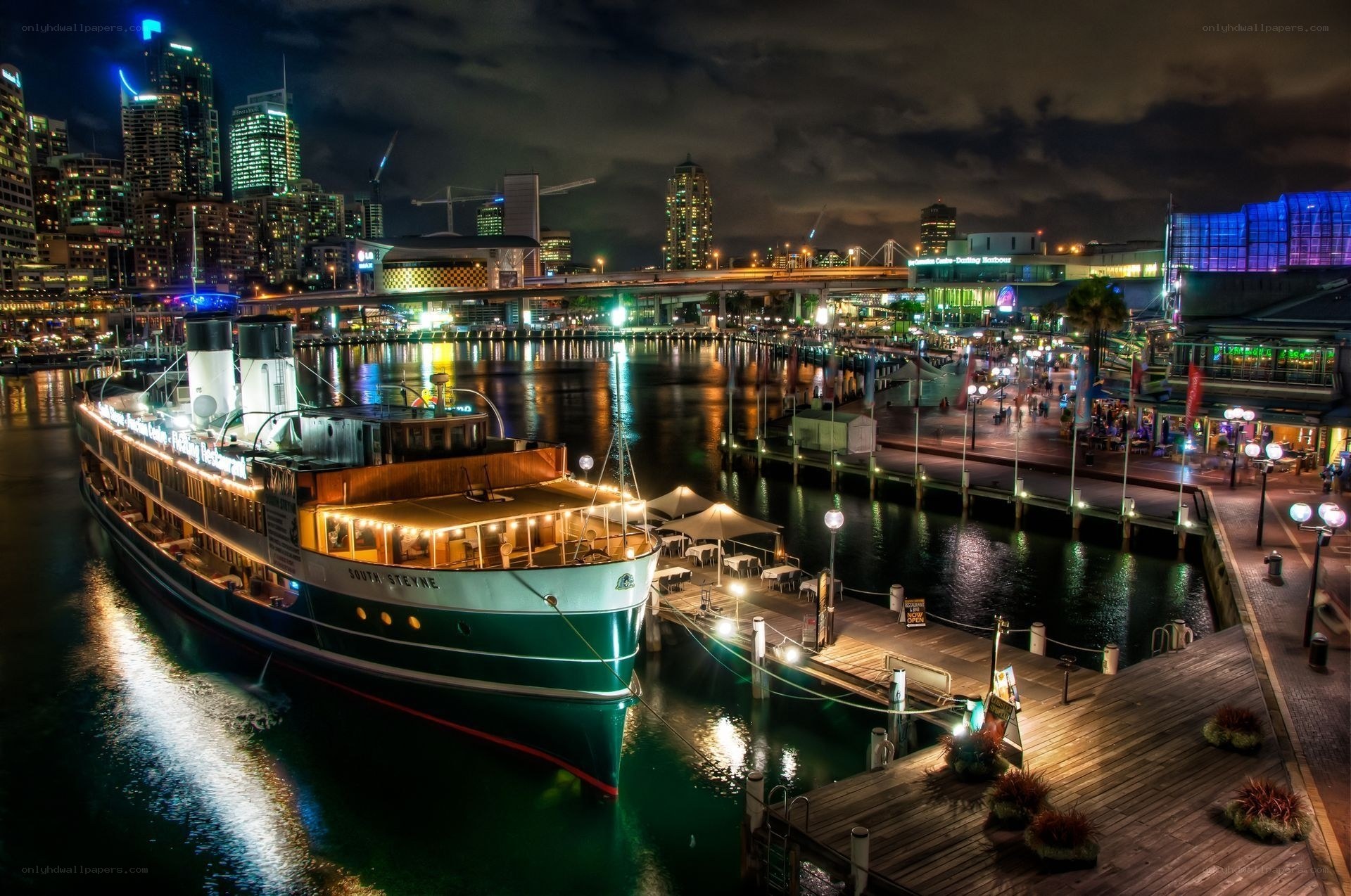 nighttime harbor with steamship
