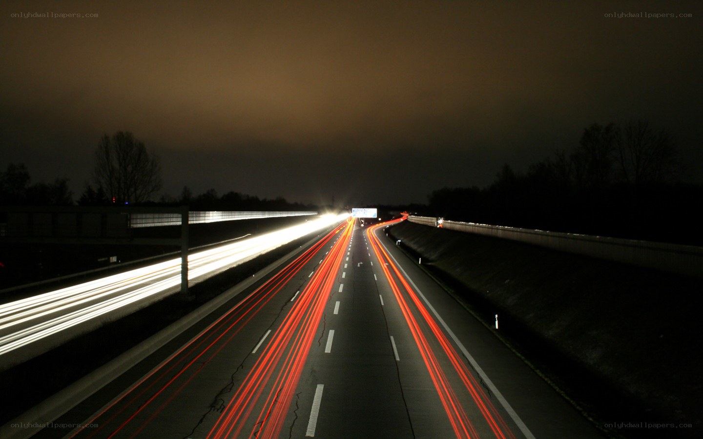 Nighttime highway light trails