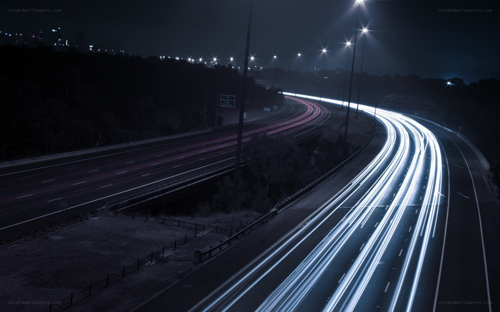 Nighttime highway light trails