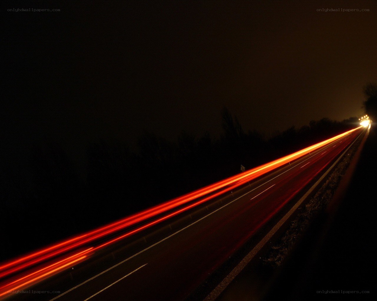 Nighttime highway light trails
