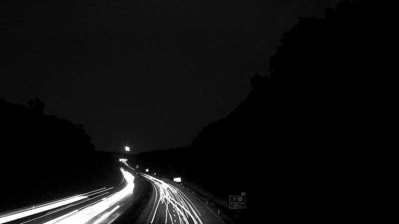 nighttime highway light trails