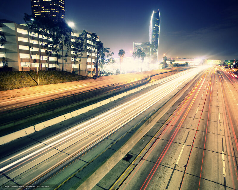 Nighttime highway traffic in city