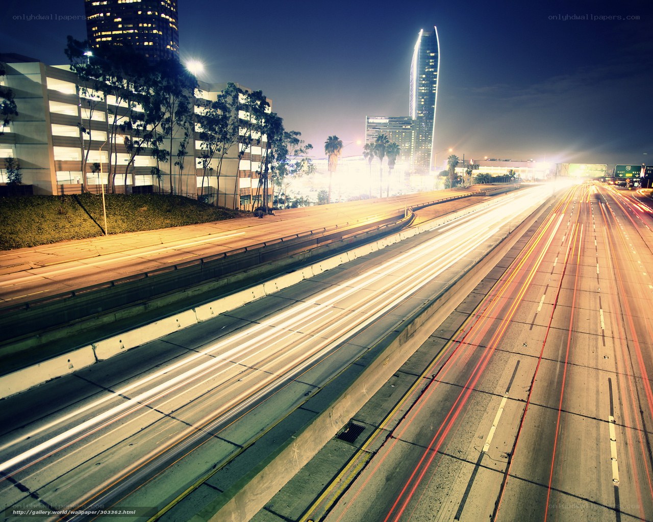 Nighttime highway traffic in city