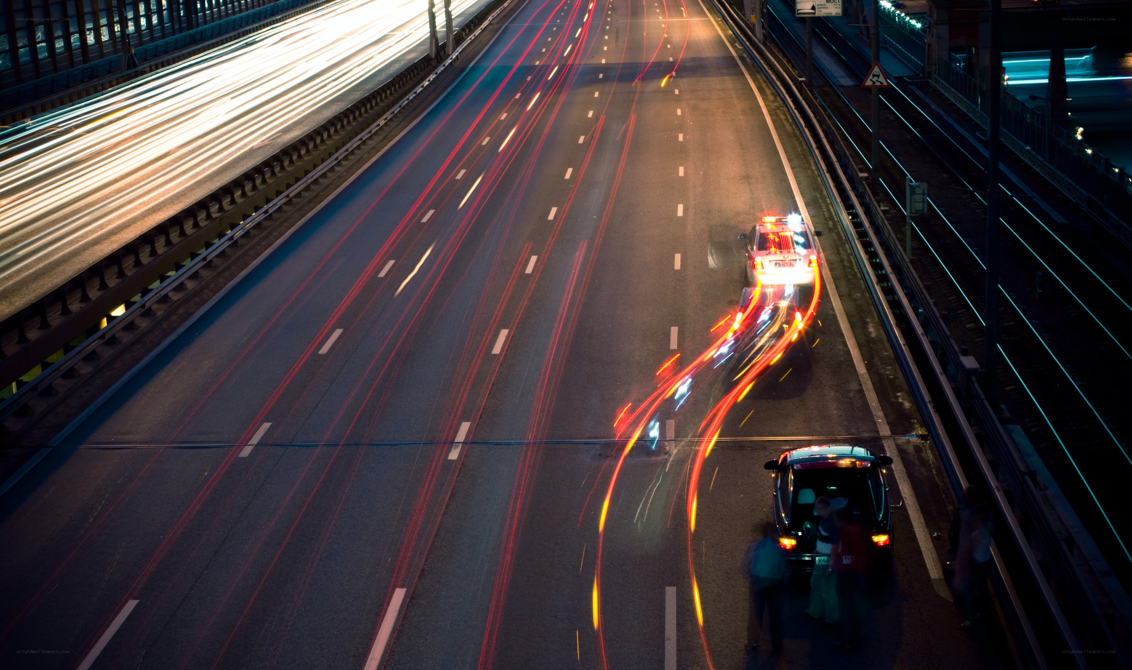 Nighttime highway traffic light trails