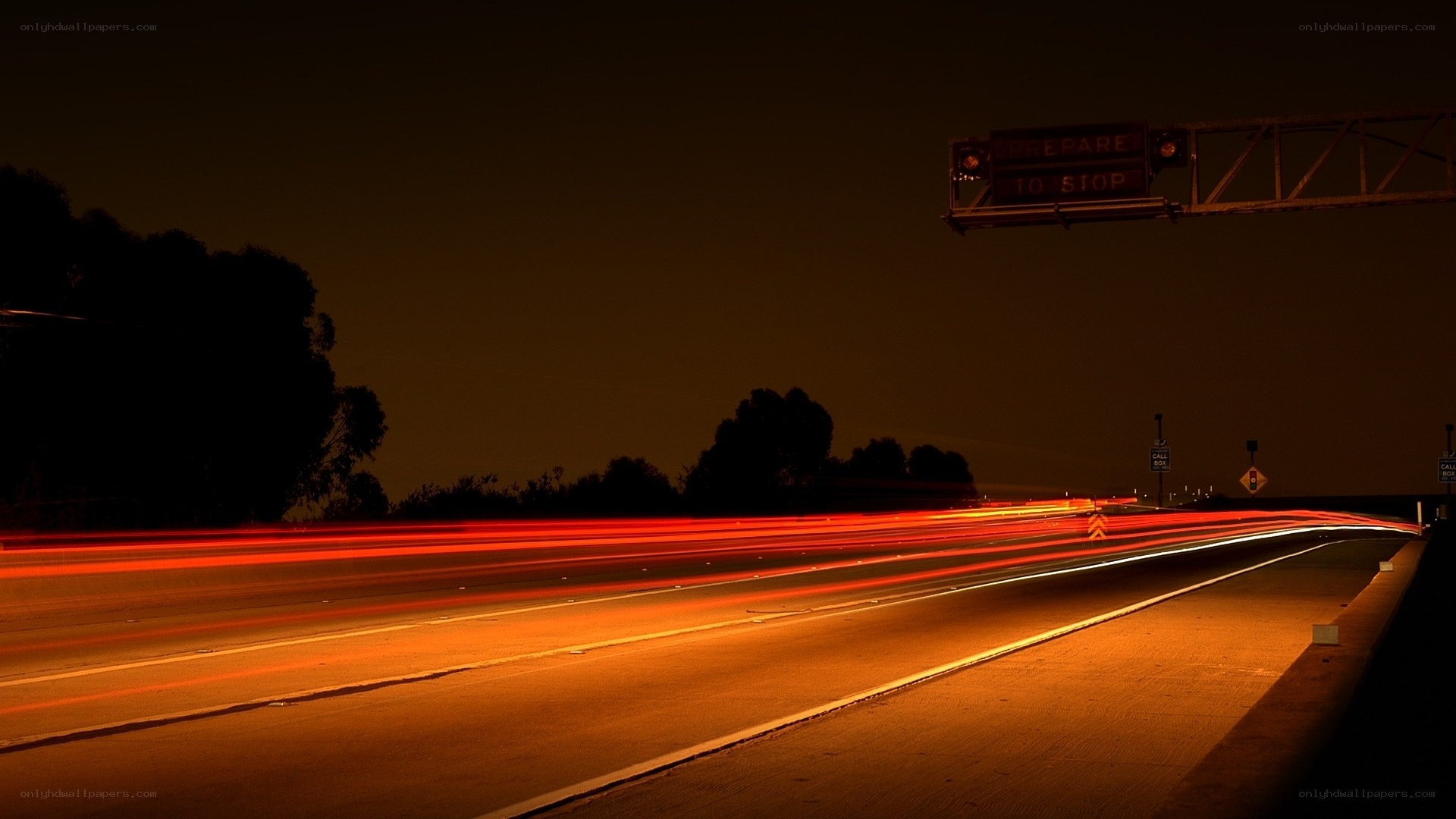 Nighttime highway traffic light trails