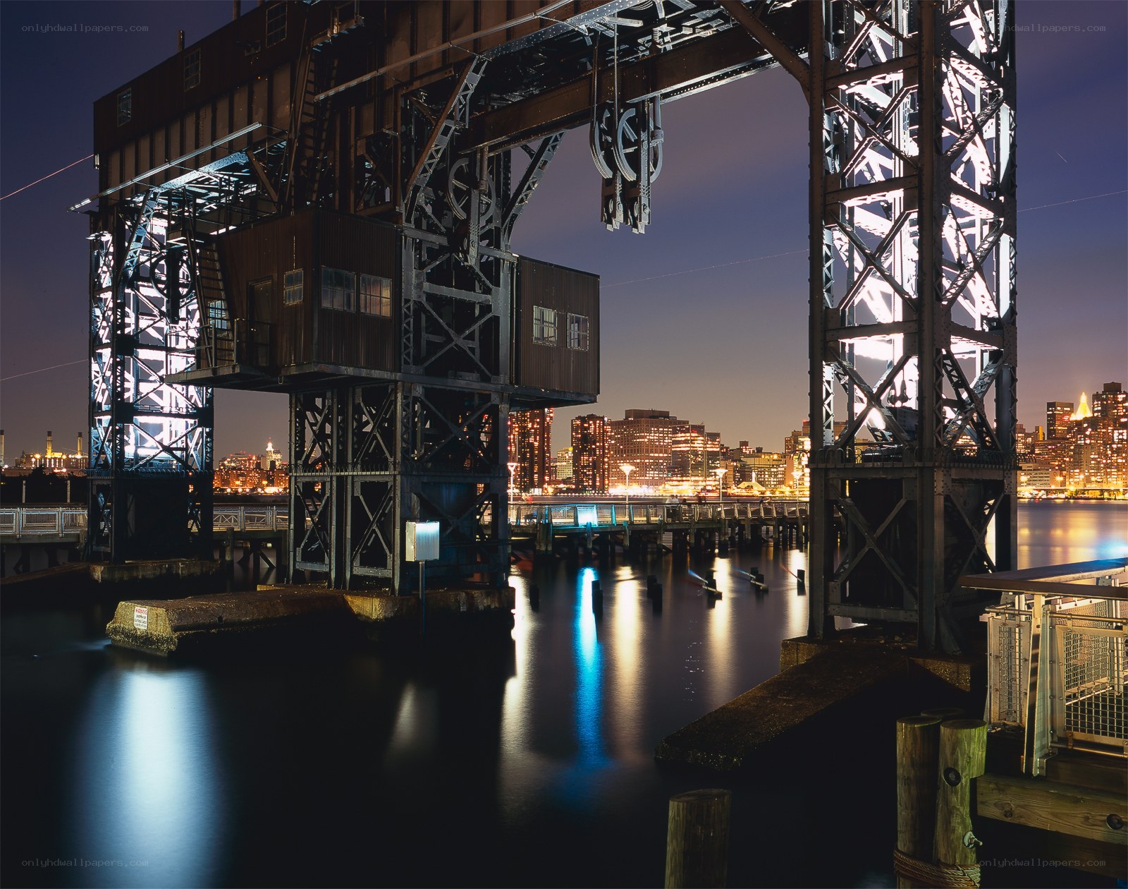 Nighttime industrial bridge view