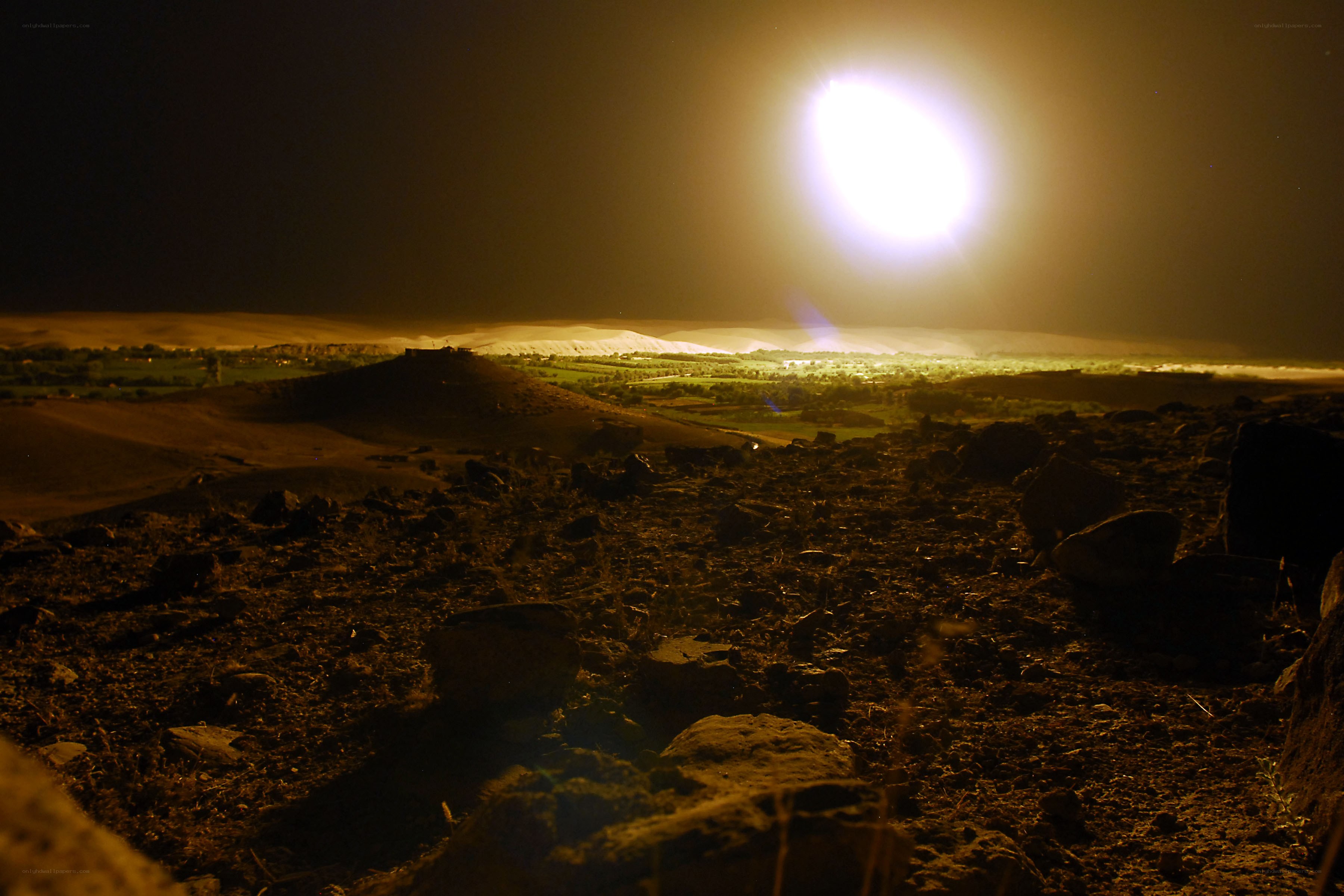 Nighttime landscape with bright light