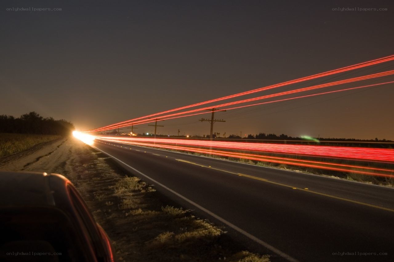 Nighttime light trails on a road