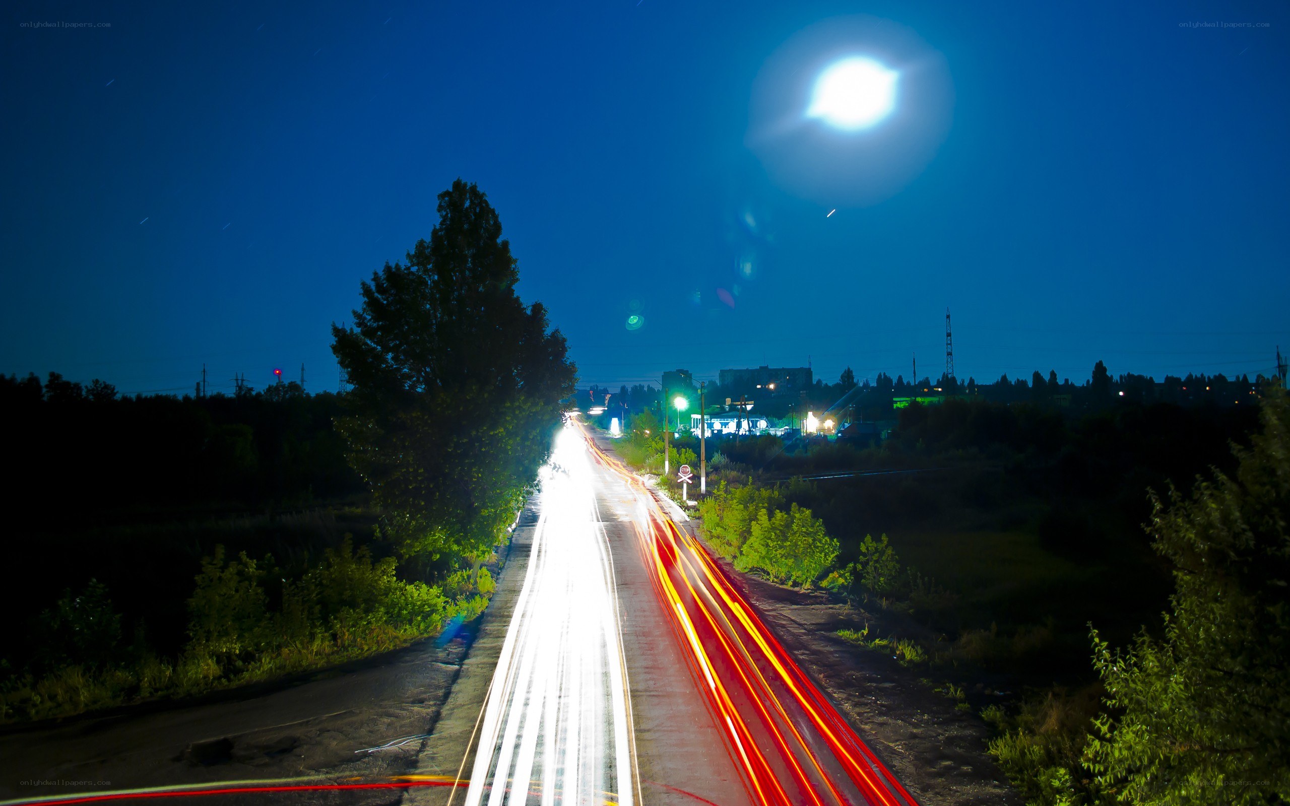 Nighttime light trails on a road