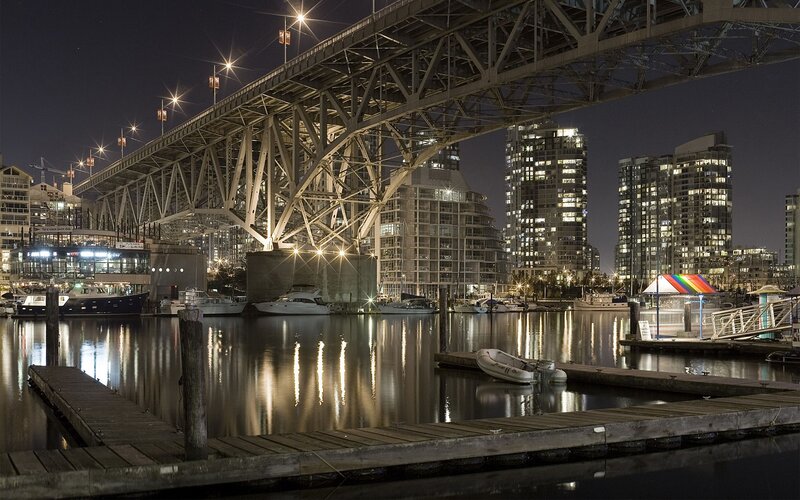 Nighttime Marina under Bridge