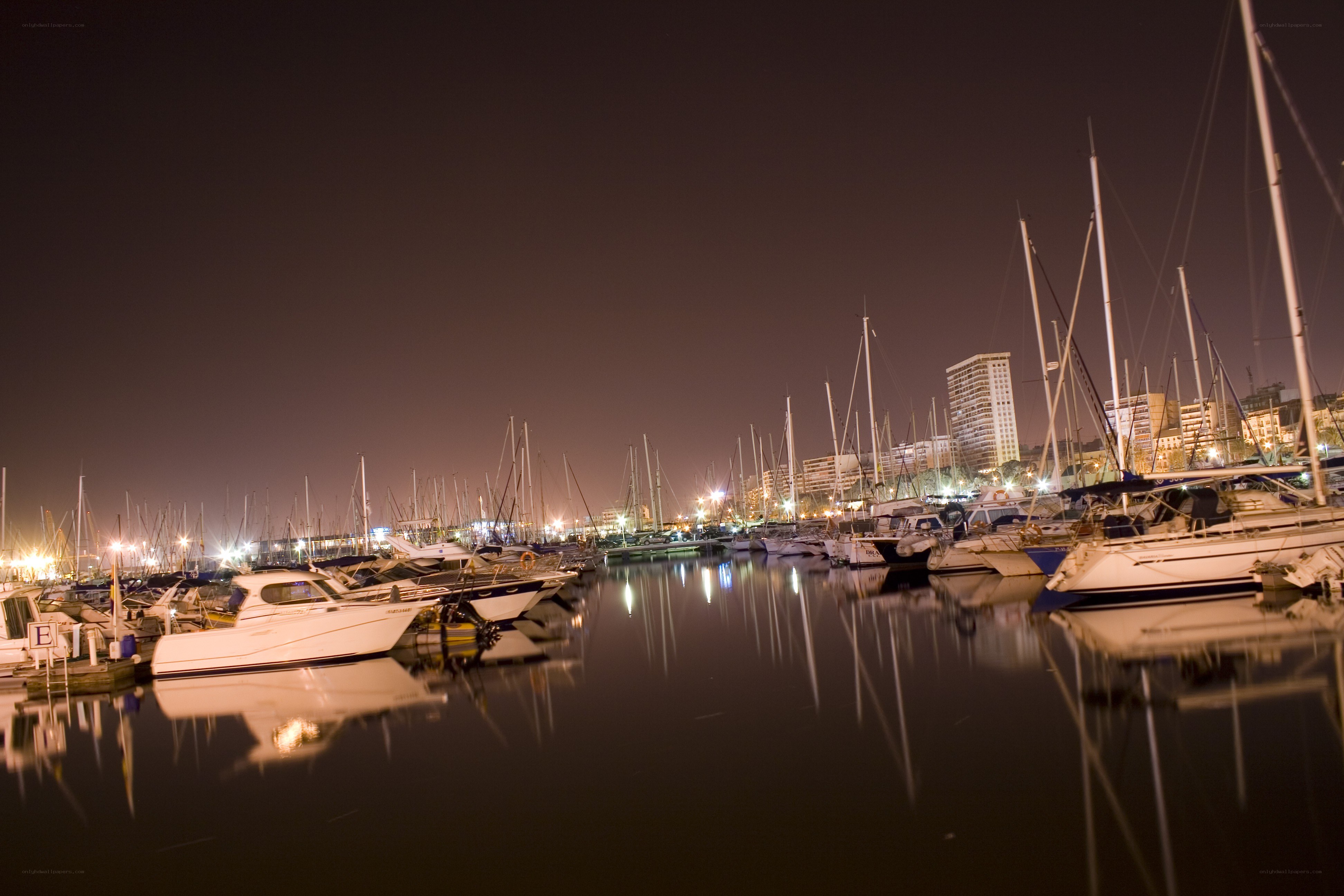 Nighttime marina with boats