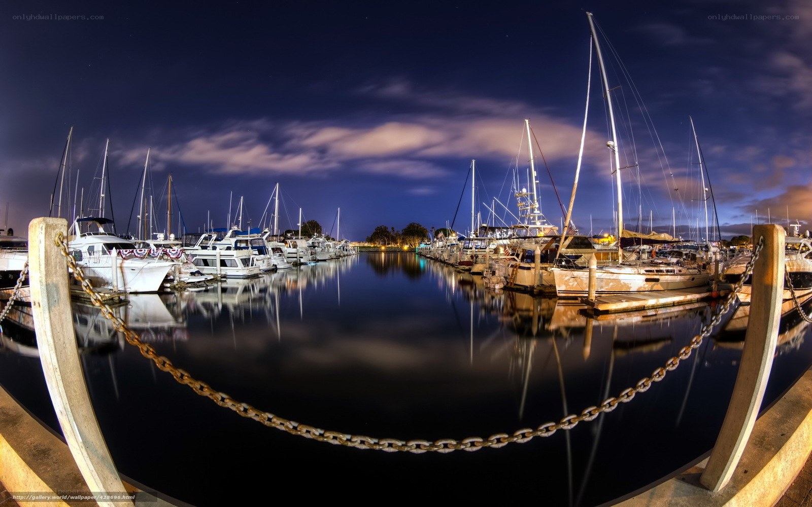 Nighttime marina with boats