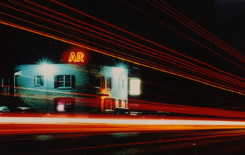 Nighttime Motel with Light Trails