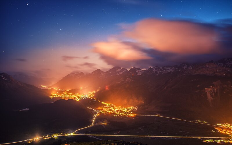 Nighttime mountain valley town
