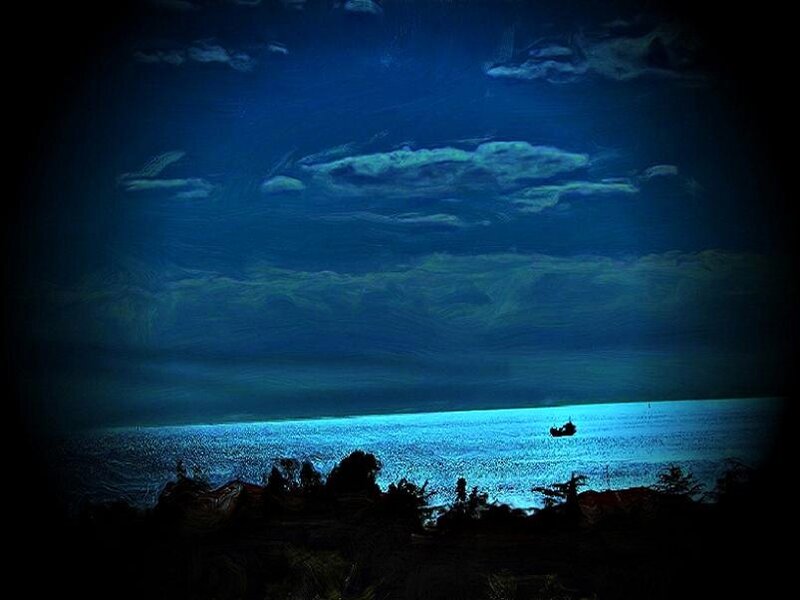 Nighttime ocean view with boat
