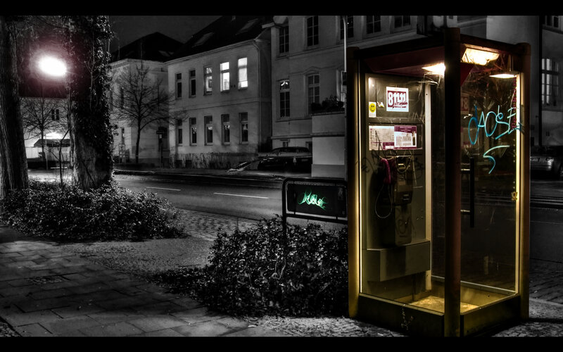 nighttime phone booth scene