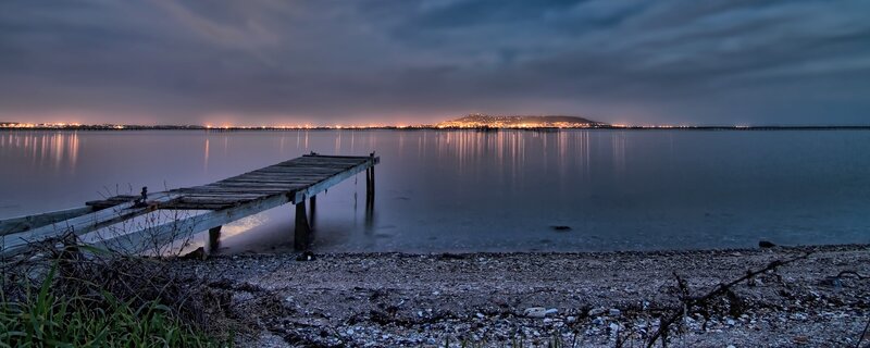 Nighttime pier by the water