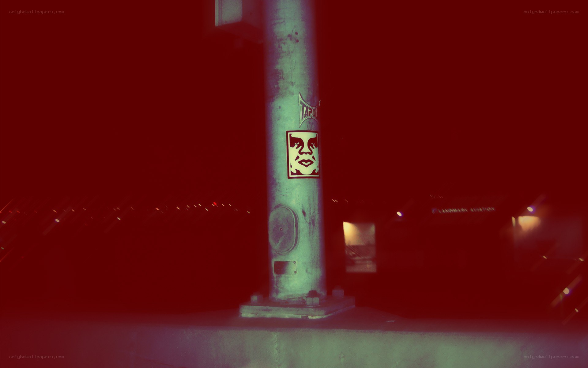 nighttime pole with stickers