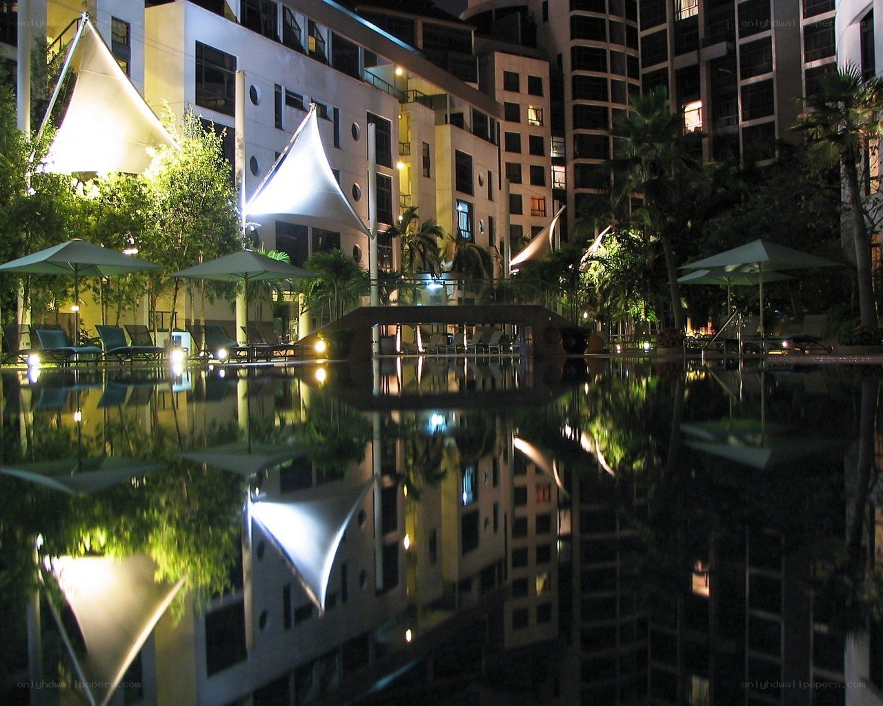 Nighttime pool area at resort