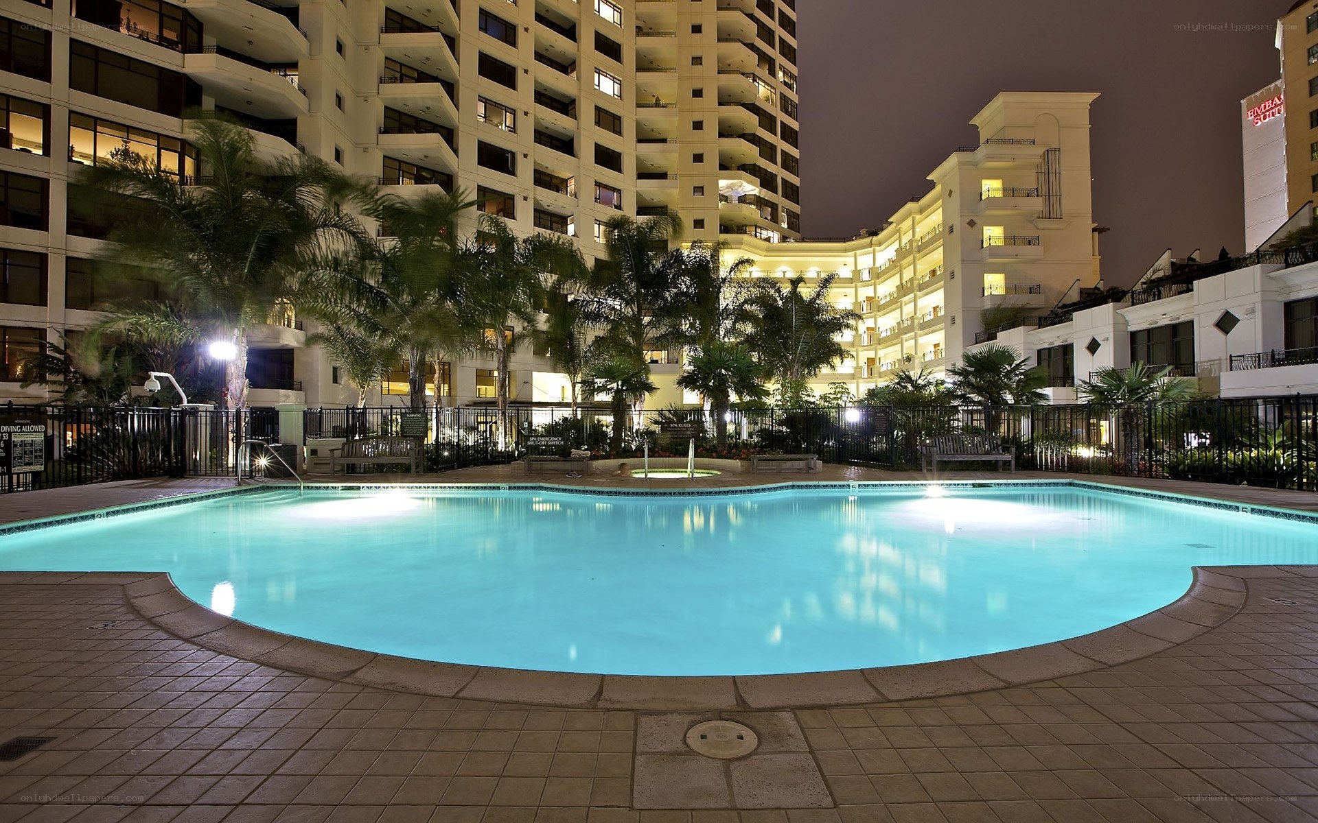 Nighttime pool at luxury hotel