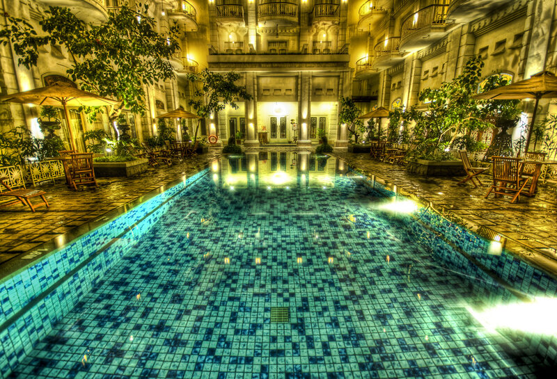 nighttime pool courtyard