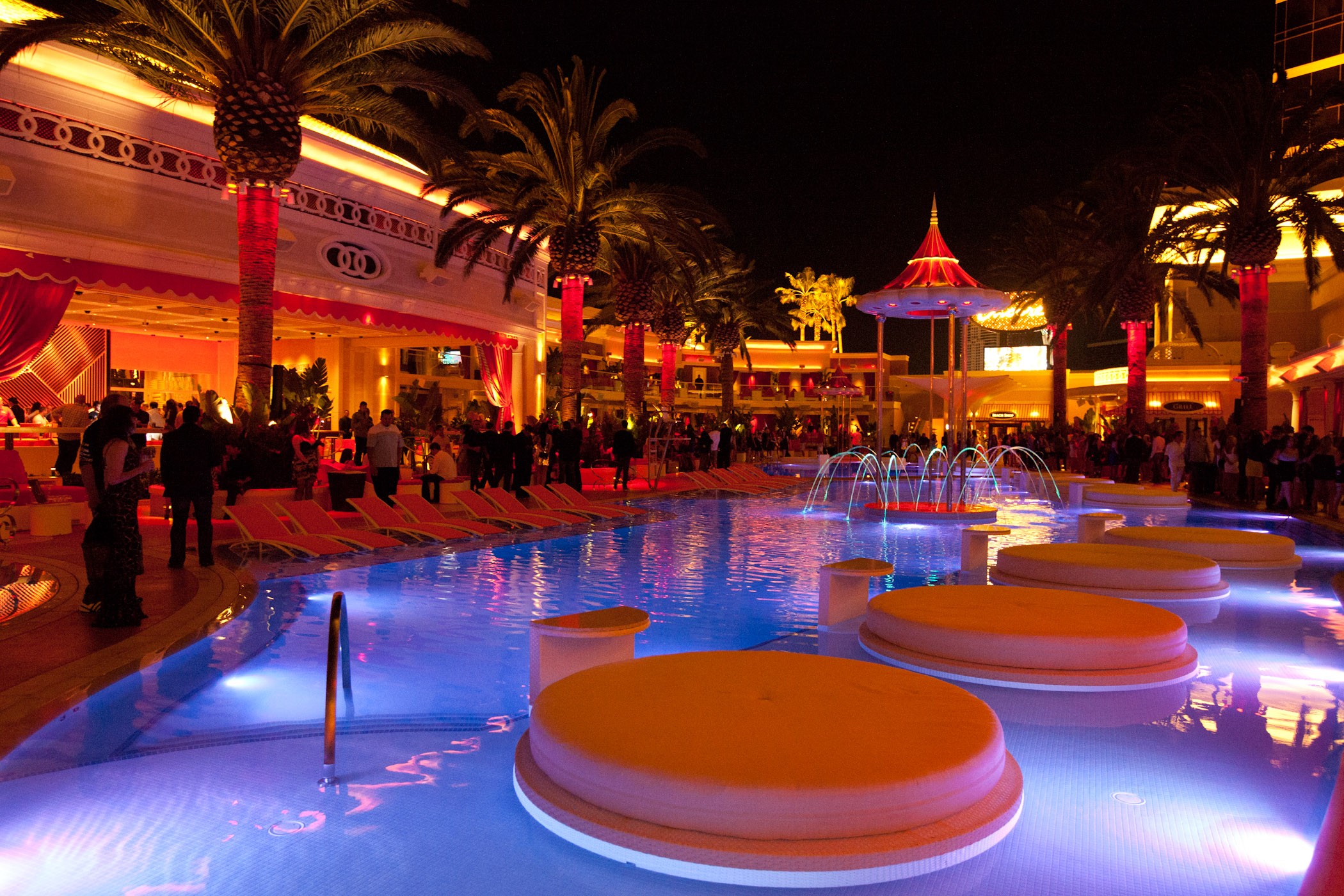 Nighttime pool party at resort