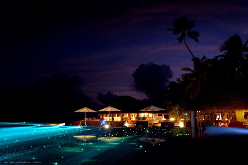 Nighttime pool resort scene