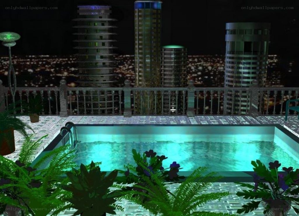 nighttime pool with city view